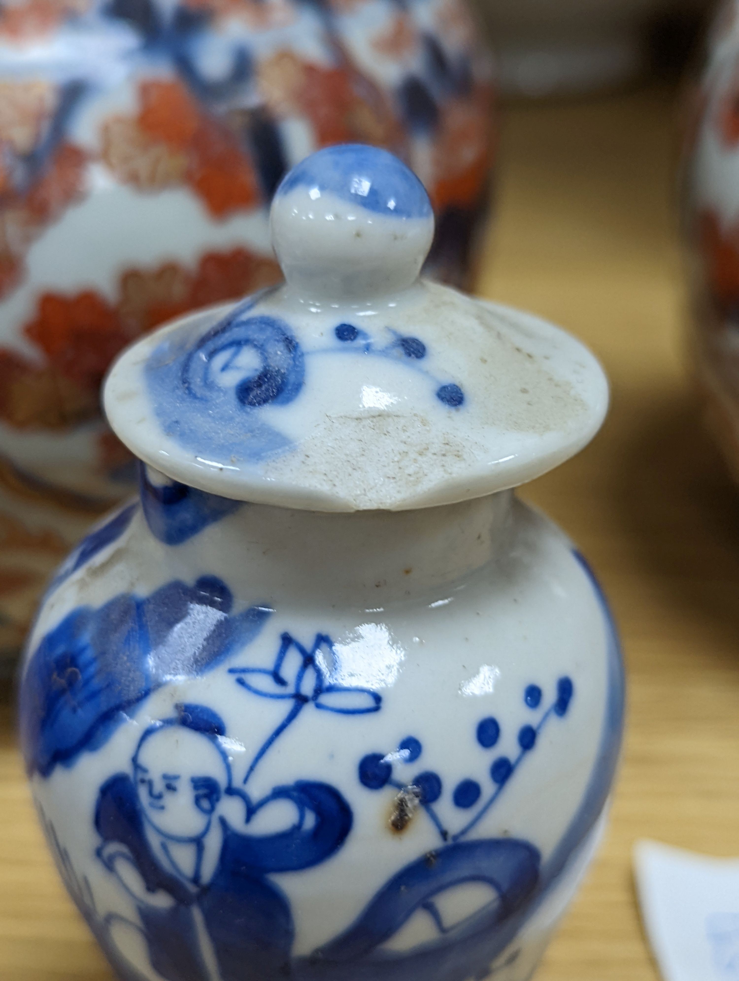 An 18th century Chinese famille rose dish, crackle-glaze stem cup, Beijing glass tea bowl and a Chinese Imari plate. Largest 24cm